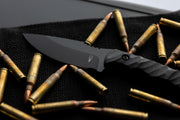 Blacked out Warlord fixed blade close up shot showing  detailed Dagr and Nott Logo