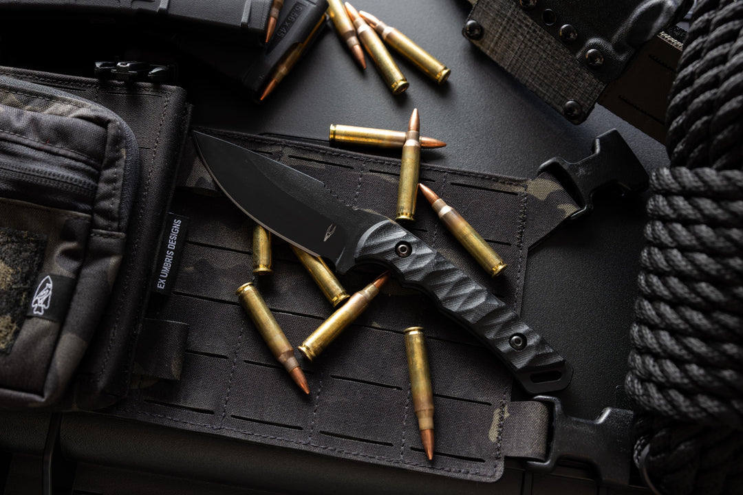 Dagr & Nott Warlord fixed blade in Magnacut, featuring a tactical pouch.
